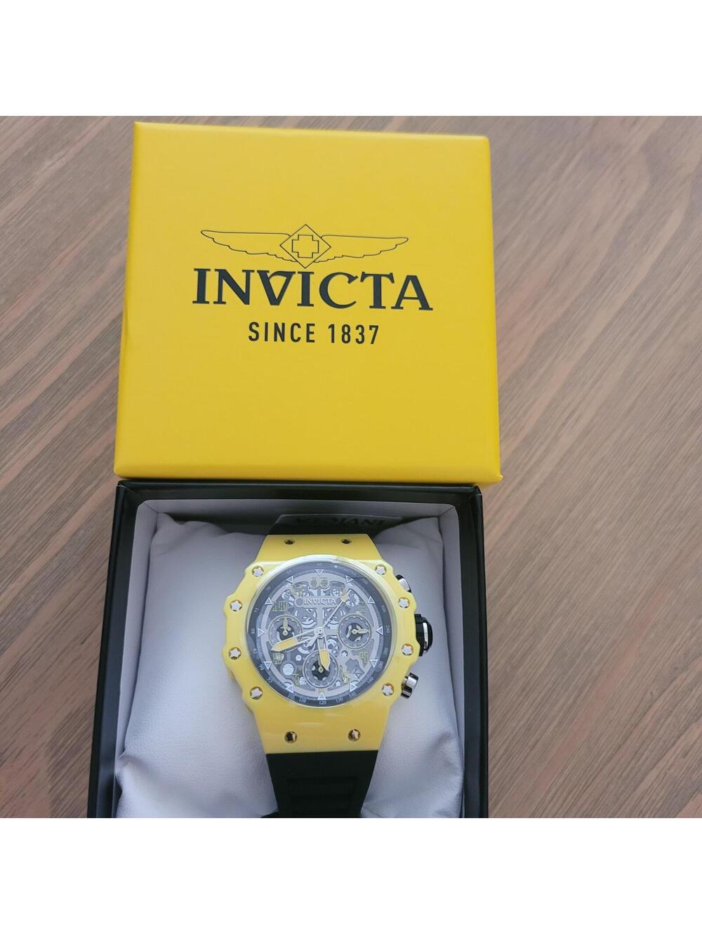 Invicta Yellow and Black Chronograph Watch with Transparent Dial